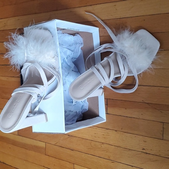 Fluffy faux feathers outline the top strap of this square-toed sandal with wrap- - Picture 5 of 7